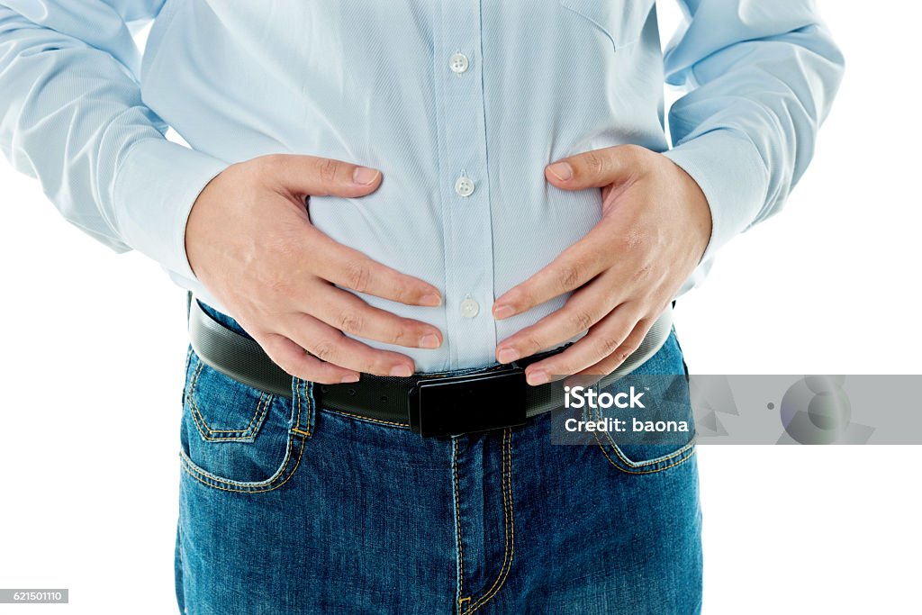 Nahaufnahme des übergewichtigen Mannes, der seinen Magen hält - Lizenzfrei Abnehmen Stock-Foto