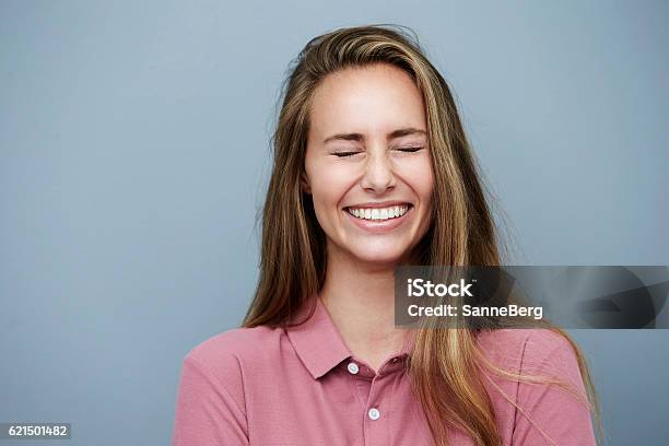 Eyes Closed And Smiling Beautiful Woman Studio Stock Photo - Download Image Now - Eyes Closed, One Woman Only, Smiling