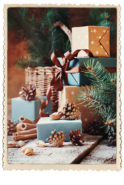 istock Gifts Boxes Pine Cones Walnut Vintage Photo Frame 621501816