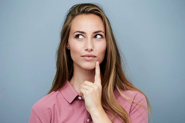 Beautiful woman in pink finding inspiration