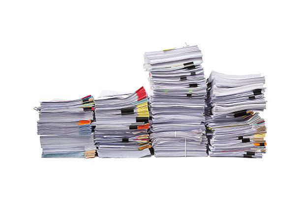 istock Stack of business papers isolated on white background 621502238
