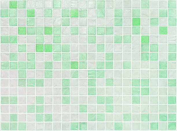istock Closeup green tiles in bathroom wall texture background 621503308