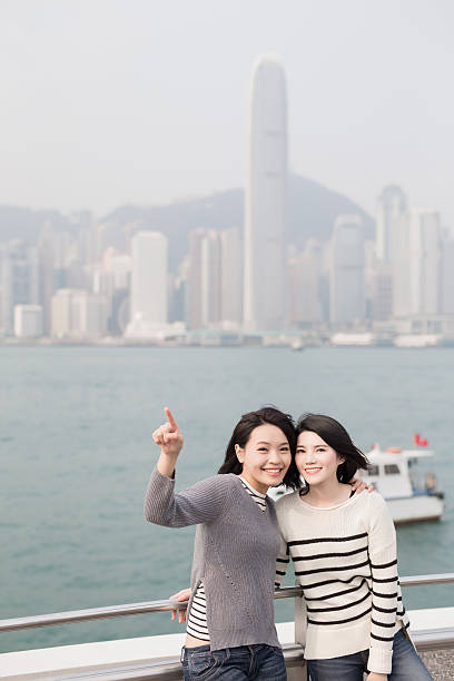 istock two beauty woman look somewhere 621504422