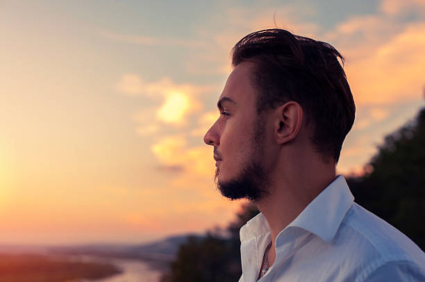 istock Young attractive bearded man standing outdoors 621504758