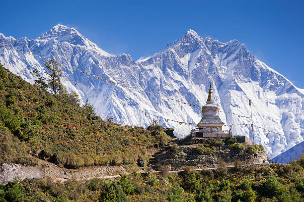 istock Buddhist stupa with mountain Lhotse behind. 621504990