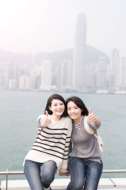 istock woman smile and thumb up 621505552