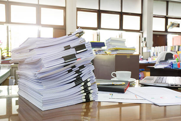 istock Business Concept, Pile of unfinished documents on office desk, Stack 621505996