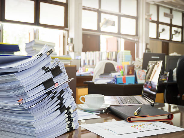 istock Business Concept, Pile of unfinished documents on office desk, Stack 621506268
