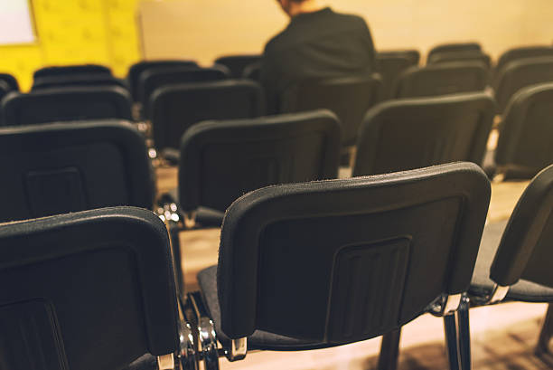 istock Unrecognizable journalist in press conference room 621507060