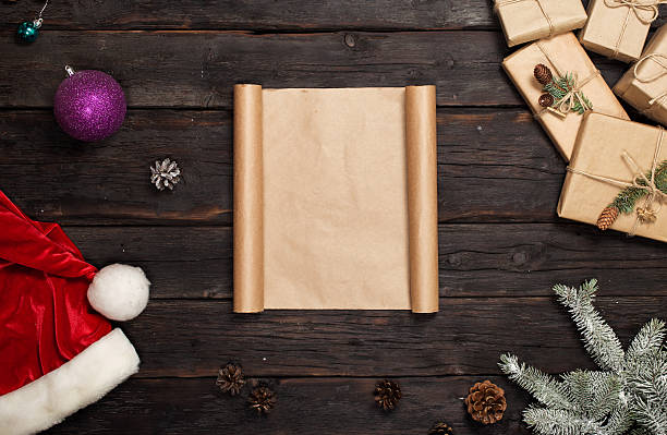 istock Blank letter on dark wooden table with Christmas presents 621507278