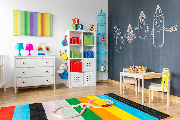 istock Child room with colorful rug 621508192