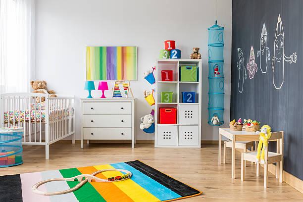 istock Spacious colorful child room 621508206