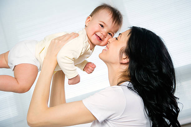 istock Mother with baby 621508486
