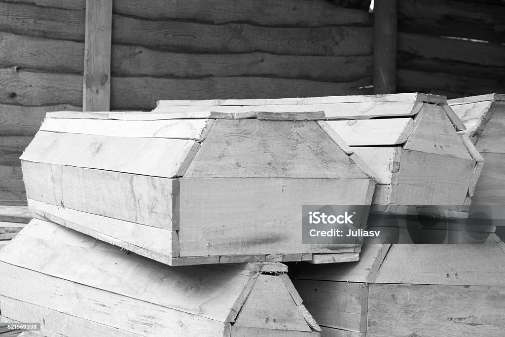 Wooden coffins of various sizes / black and white photo Wooden coffins of various sizes / black and white photo in a retro style Cremation Stock Photo