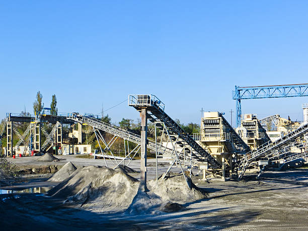 istock Conveyor and mining equipment in a granite quarry 621570292