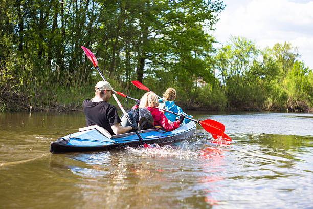 istock Young people are kayaking on a river in beautiful nature 621570314
