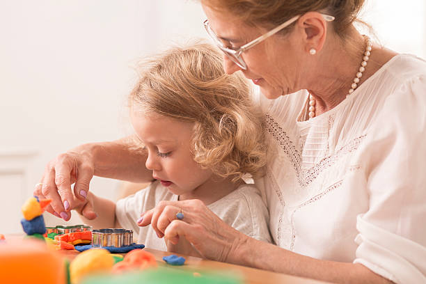 istock Manny helping to make a  toy 621571064