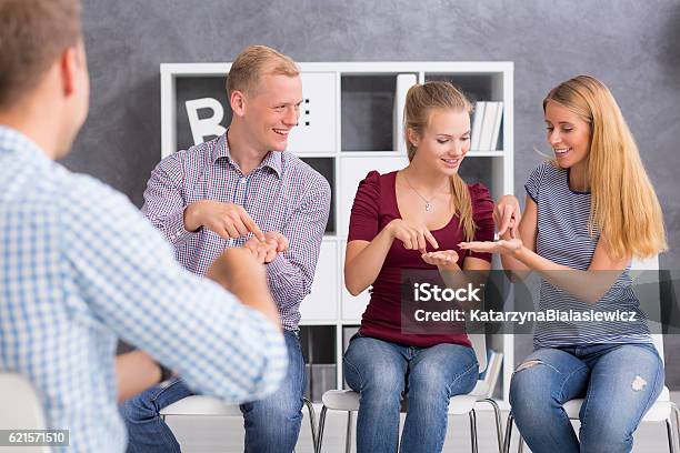 People During Sign Language Course Stock Photo - Download Image Now - Teacher, Sign Language, Classroom