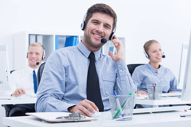 istock Businessman in customer service department 621571766