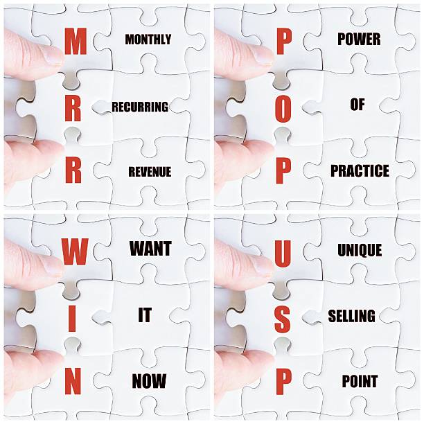 istock Hand of business man completing the puzzle 621572612