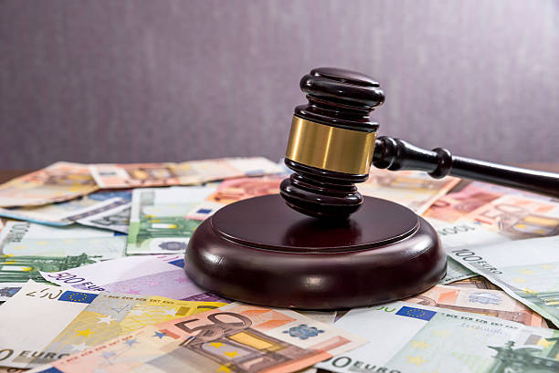 istock Judge's hammer with  Euro currency 621574356