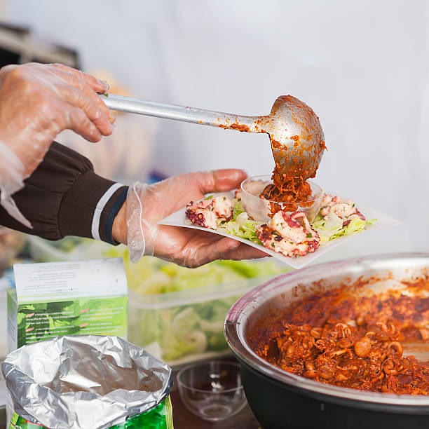 istock Street food. Stewed cuttlefihs 621576068