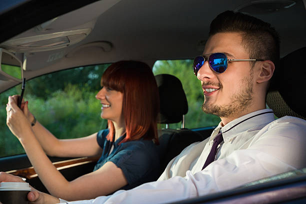 istock Business Couple In Car 621576096