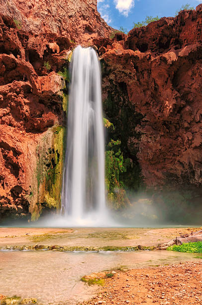Beautiful waterfall in the Grand Canyon, Arizona Mooney Falls, Havasu Canyon, Havasupai Indian Reservation, Arizona. Long exposure havasu falls stock pictures, royalty-free photos & images