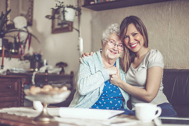 istock Social worker is visiting a senior woman 621577248