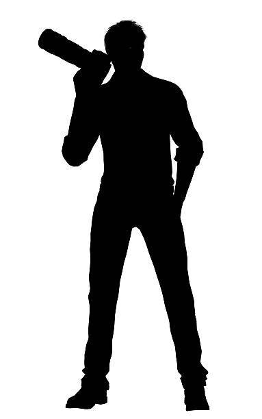 Silhouette of a photographer with dslr camera isolated on white