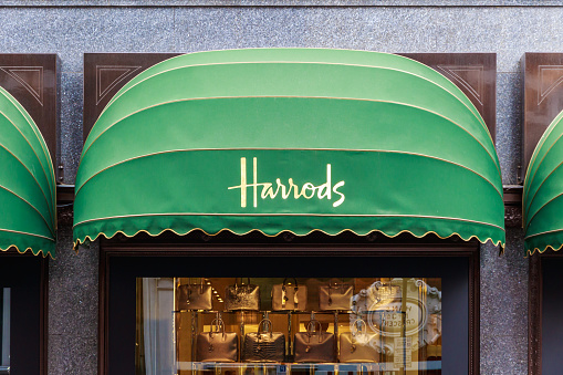 London, UK - October 19, 2016 - Display windows of Harrods, an upmarket department store