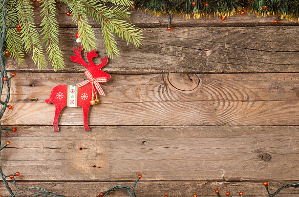 istock Christmas decorations. Fir tree branch, electrical garland and r 621579250