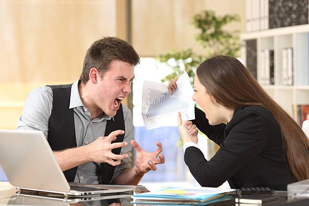 istock Two angry businesspeople arguing furious 621579876