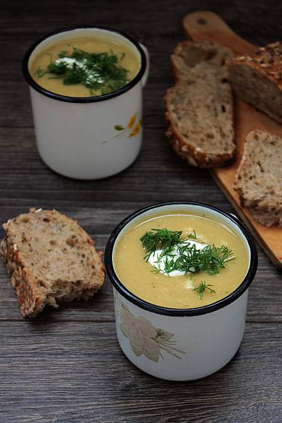 istock Lentil cream soup with cream cheese and dill in mug 621580830