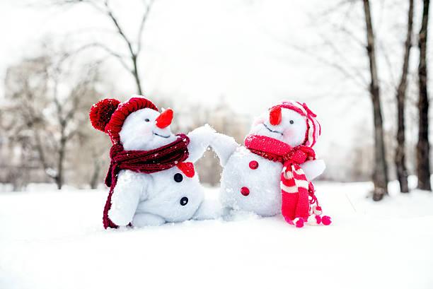 istock Couple of snowmen 621581142