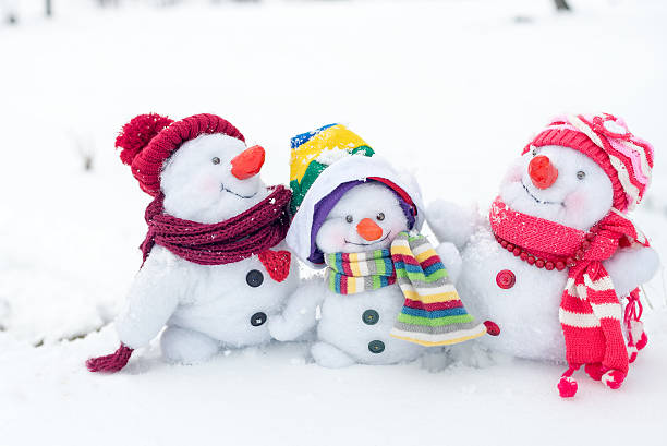 Happy snowman family stock photo