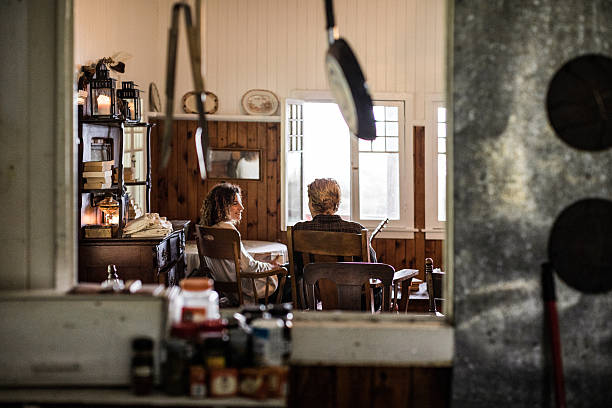 istock Young couple enjoying an hot tea in cabin 621583768