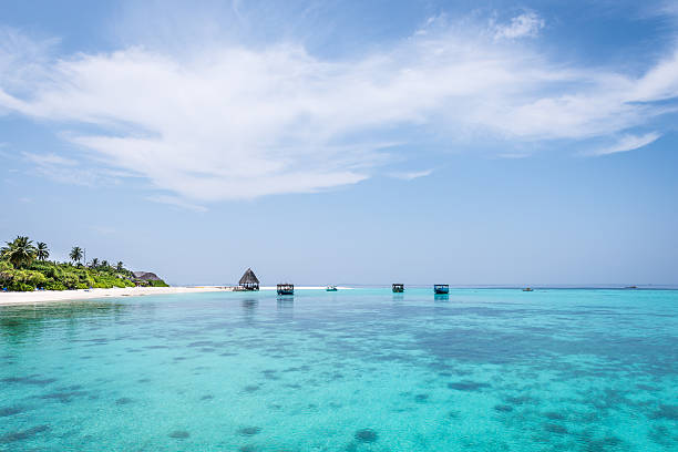istock Panorama of tropical lagoon in Indian Ocean. 621584352