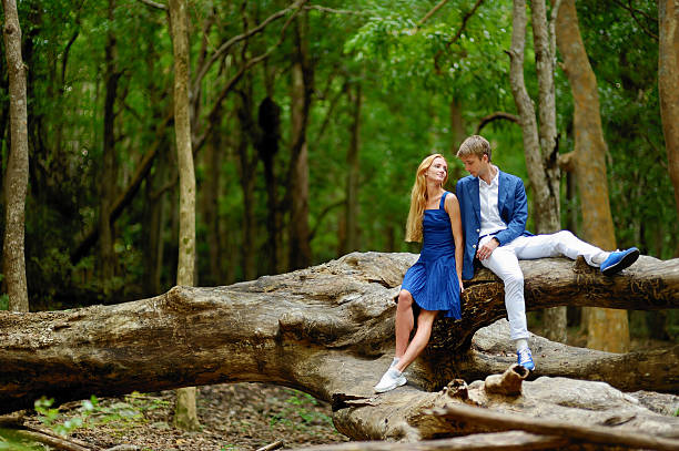 Symbolic image of young unhappy couple breaking up