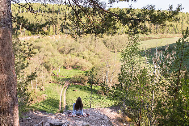 istock woman sits on the edge 621585460