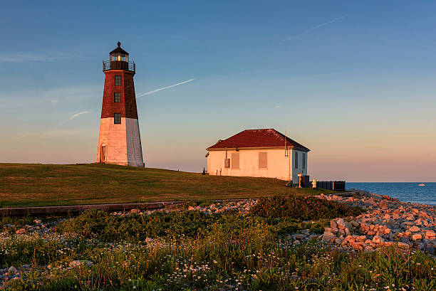 istock Sunset at Atlantic coast, Point Judith lighthouse, Rhode Island 621586248