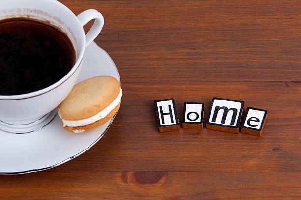 istock Home. On wooden table coffee mug, cookie 621587854