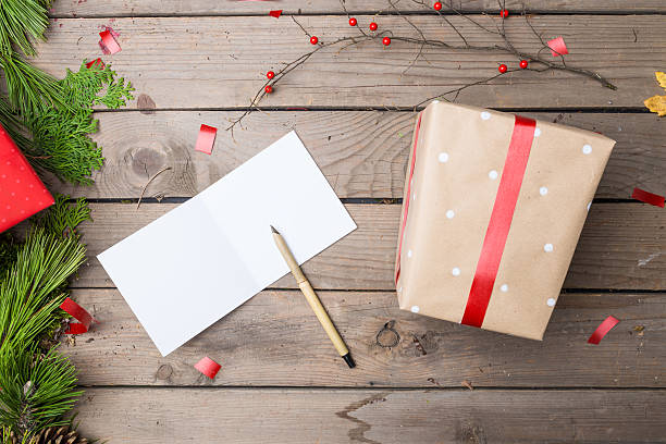 istock Square Bi-fold Greeting card on wooden planks 621588070