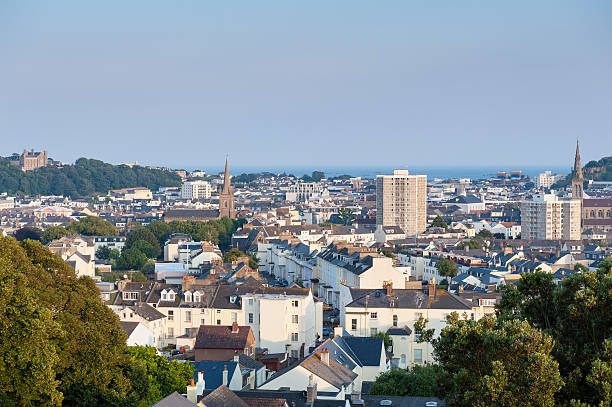 Saint Helier Jersey around sunset View over Saint Helier, capital of Jersey, Channel Islands, UK on summer evening around sunset. channel islands england stock pictures, royalty-free photos & images