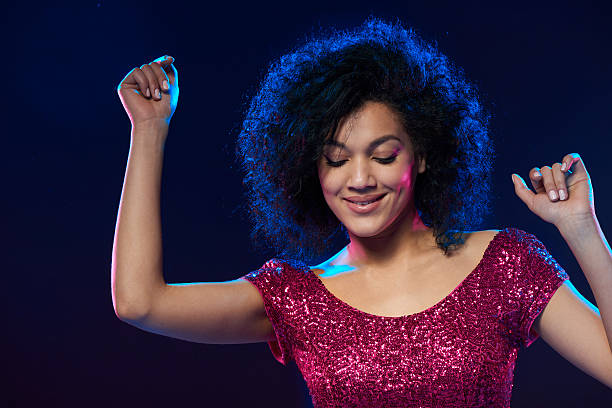 istock Woman dancing on a party 621589274
