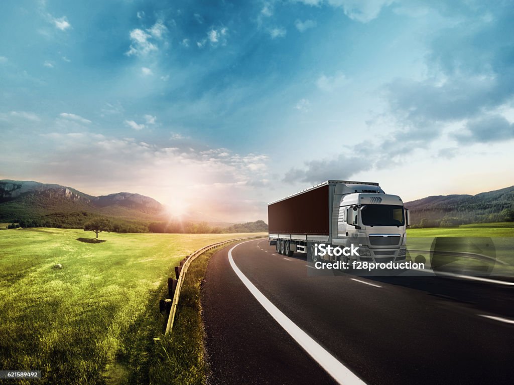 Truck on the Road On The Move, Truck, Truck on the road. Truck Stock Photo