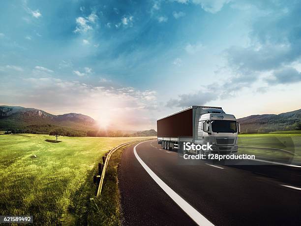 Truck On The Road Stock Photo - Download Image Now - Truck, Road, Green Color