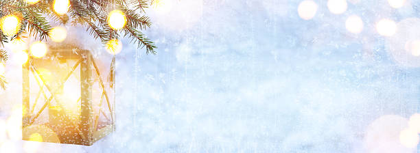 istock art Blue Christmas; Christmas tree and Holidays light on snow 621590378