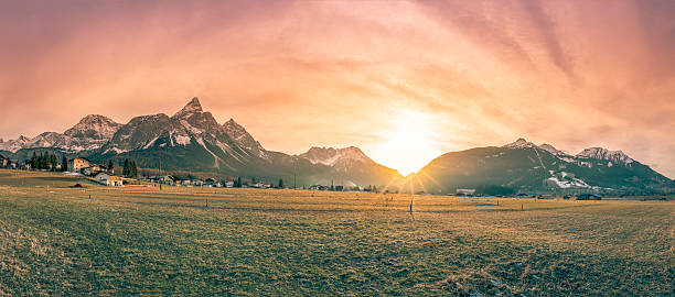 istock Mountain village and the Alps at dusk 621590486