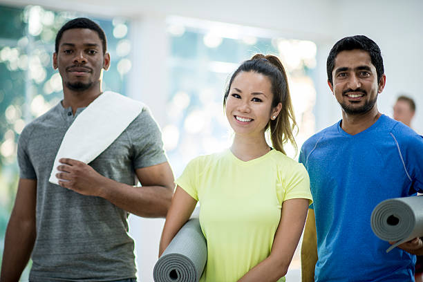 istock Taking a Yoga Class at the Gym 621593990